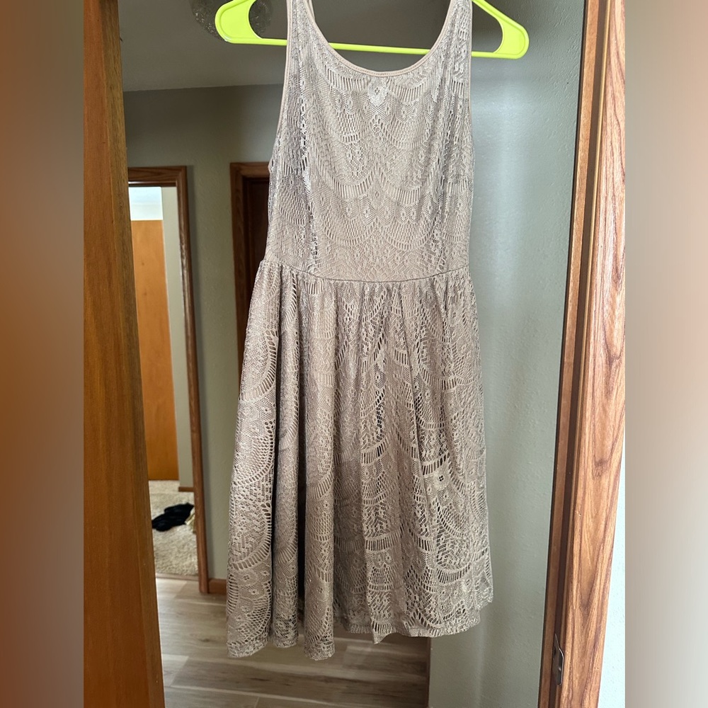 Ya Los Angeles brown dress with open back. Size medium.